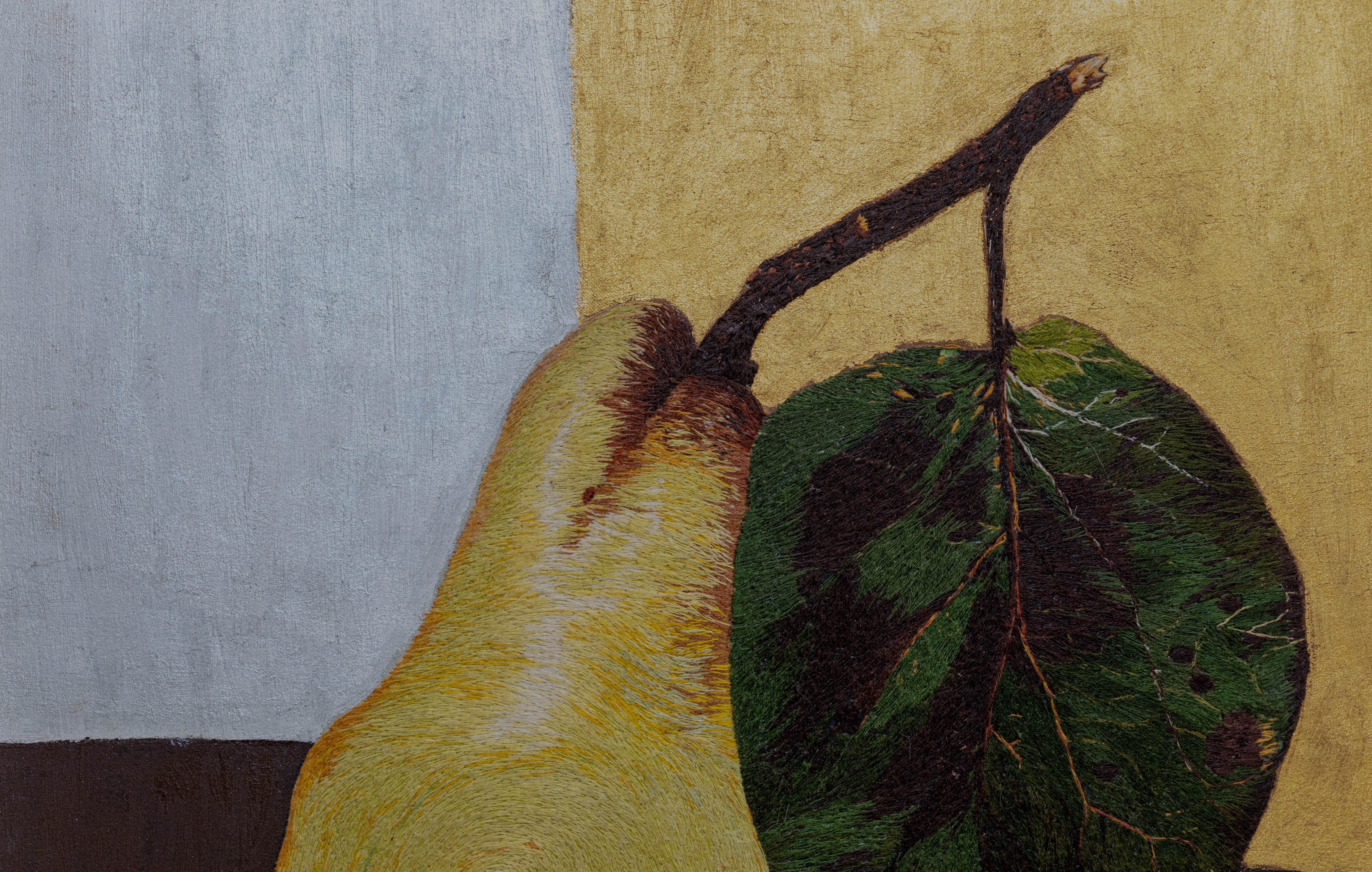 Portraying still life in the form of a fruit past its prime. Decay in the leaves and the changing colours of a ripening fruit have been portrayed true to form. Incorporation of a whorl in the body of the pear was an added twist
A coming together of pure earth tones depicted in the yellow browns of an over ripened fruit and the muddy greens of a decaying leaf.